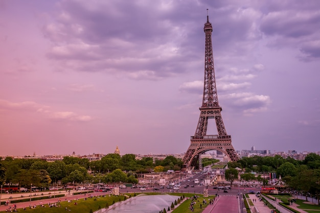 France. Paris. Eiffel Tower and fountains of the Trocadero Gardens. Pink summer evening