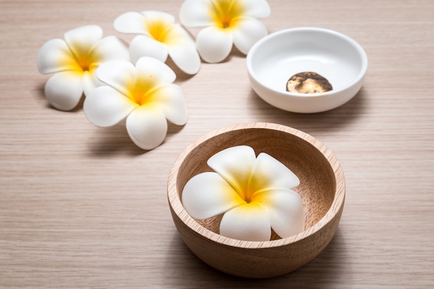 Frangipani flowers on white background. Concept for spa background