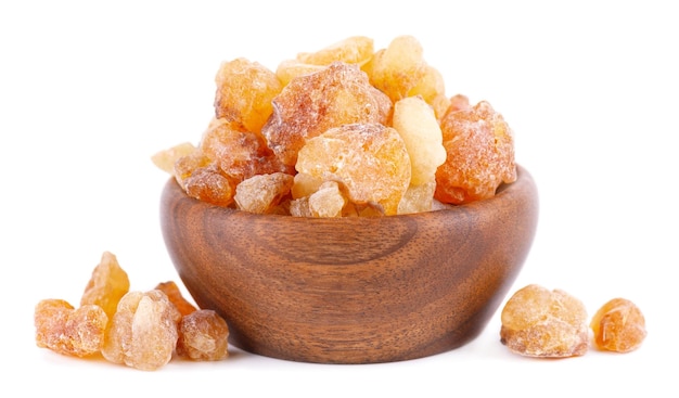 Frankincense resin in wooden bowl isolated on white background Pile of natural frankincense Olibanum Incense