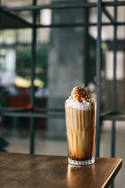 frappe coffee placed on the table in a cafe.