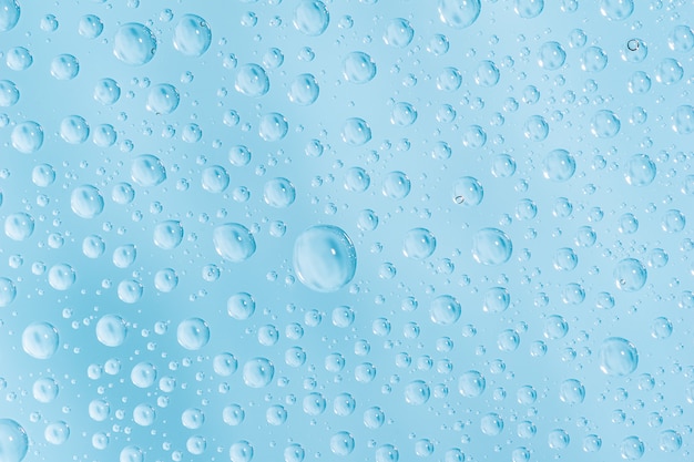 Frash water drops on glass surface