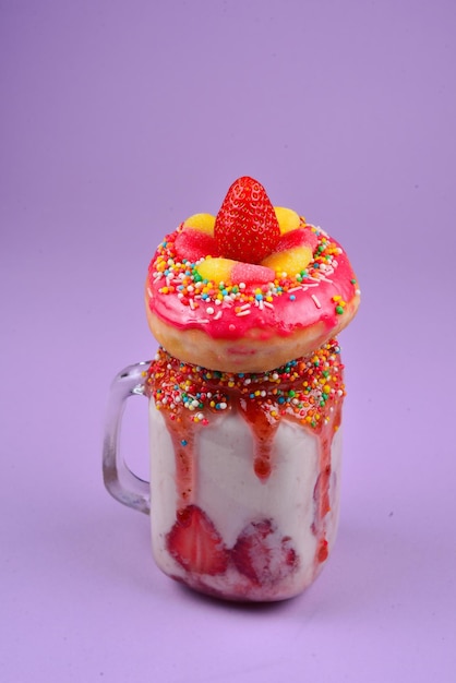 Freakshake Extreme milkshake with strawberry jelly sweets donut