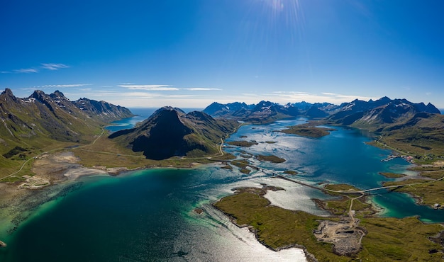 Fredvang Bridges Panorama. Lofoten islands is an archipelago in the county of Nordland, Norway. Is known for a distinctive scenery with dramatic mountains and peaks, open sea and sheltered bays.