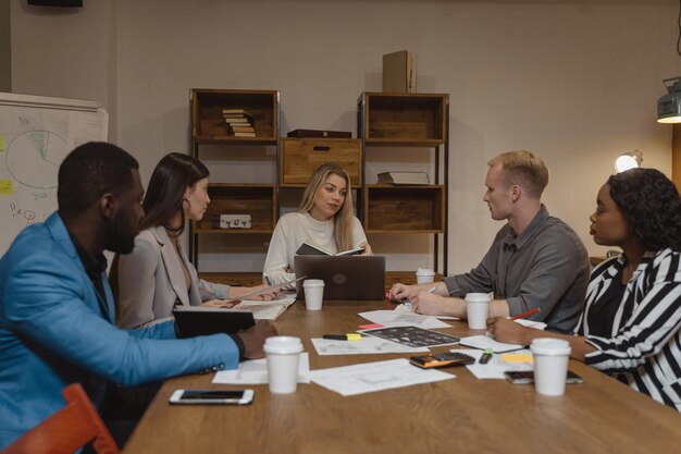 Free photo people during a meeting showing a presentation