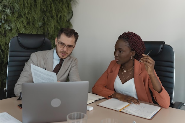 Free photo people during a meeting showing a presentation