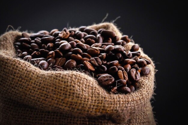 Free photo a top view hot espresso with brown coffee seeds on the brown wooden desk coffee cup drink