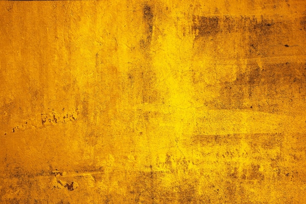 Free photo yellow wall texture with scratches