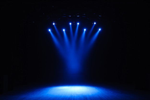 Free stage with lights, lighting devices. Night show.