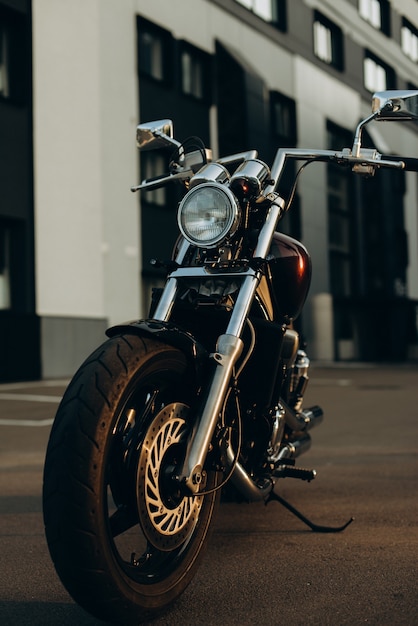 freedom.motorcycle parking, front view. stylish custom chopper motobike with chrome details. soft selective focus.