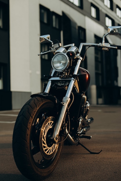 Freedom.Motorcycle parking, front view. Stylish custom chopper motobike with chrome details. Soft selective focus.