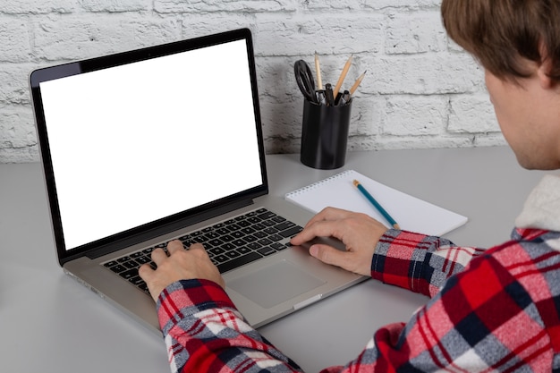 Freelancer at his working place. Laptop screen mockup