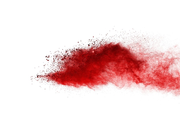 Blocca il movimento della polvere di colore rosso che esplode su bianco