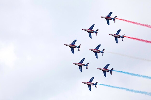 The French Air Patrol French Patrouille de France performing a demonstration to celebrate the Bastille Day