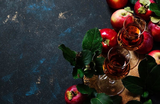 French apple brandy or calvados dark drink autumn background top view