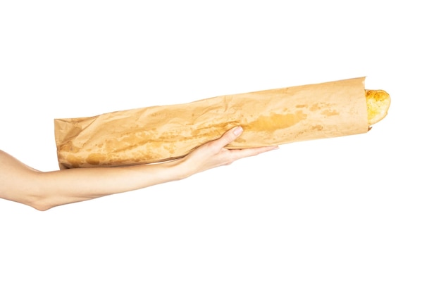 French bread baguette in hand isolated on white background