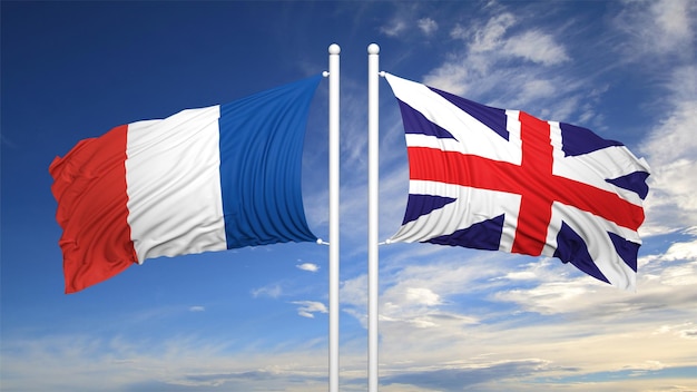 Bandiere francesi e britanniche contro il cielo