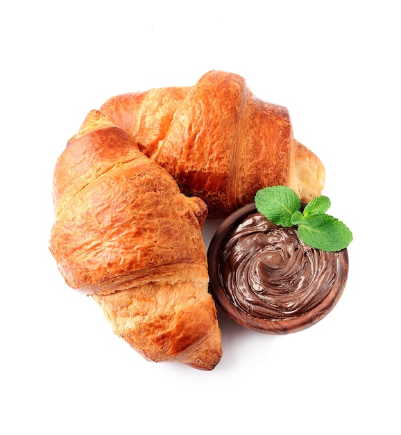 French croissants with chocolate and mint. Breakfast. Bakery.