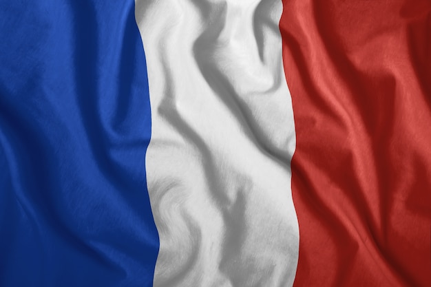 The French flag flutters in the wind