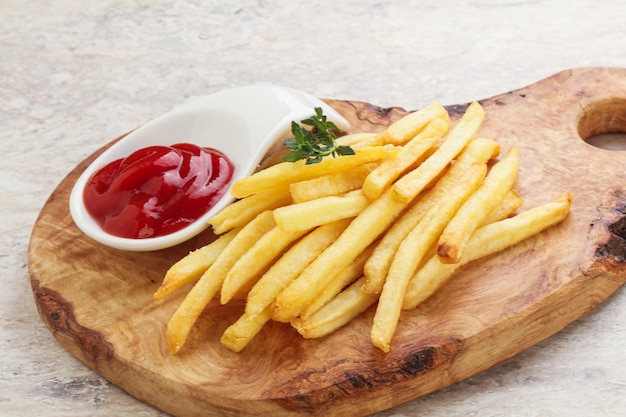 French fried potato over board