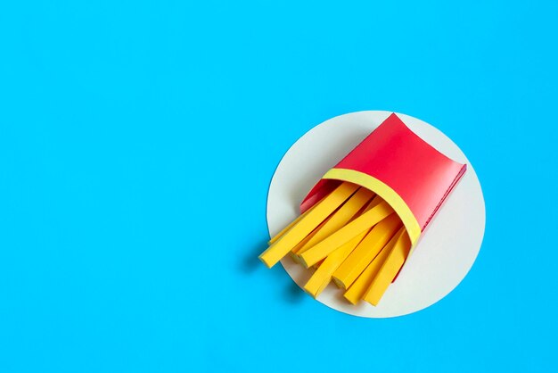 French fries in box made of paper