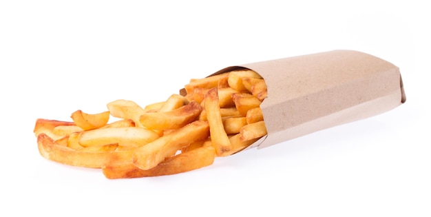 French fries in a brown paper bag isolated on a white background