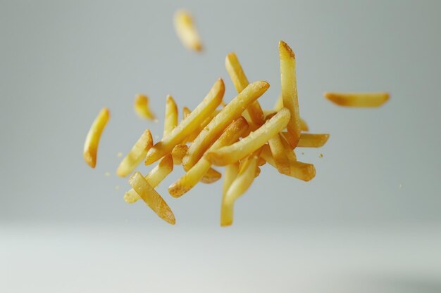 Photo french fries levitate on white background