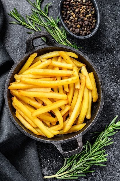 French fries in a pan, fried potatoes