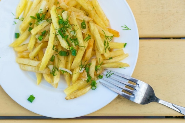 French fries on a plate in a cafe