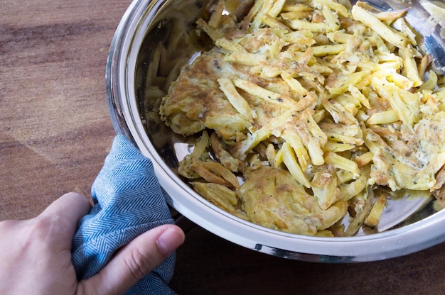 French fries prepared with omelet