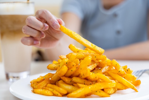 French fries with cheese in restaurant