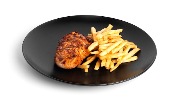 French fries with grilled chicken fillet isolated.