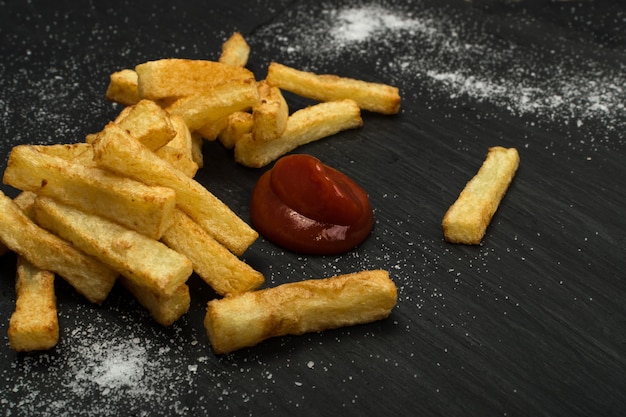 French fries with ketchup closeup