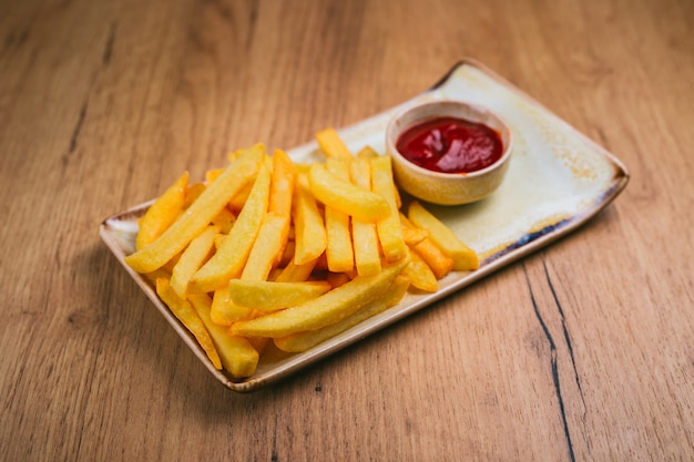 French fries with ketchup on a plate