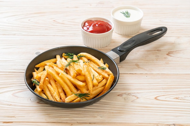 French fries with sour cream and ketchup