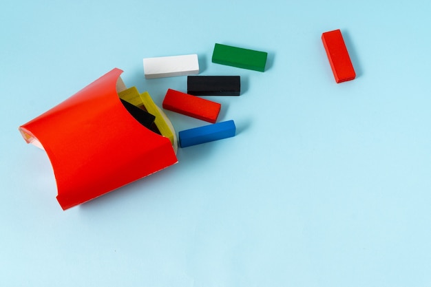 French fry concept with a colorful wooden cuboid shape.