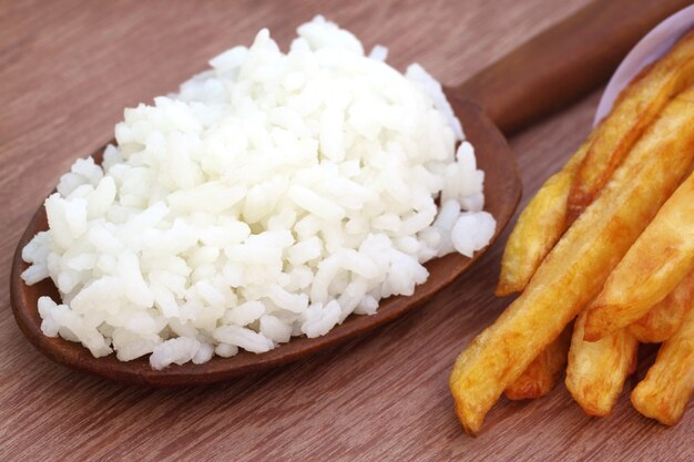 Photo french fry with fresh rice close up