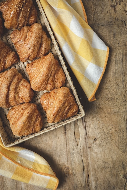 French Homemade fresh croissants on wooden table