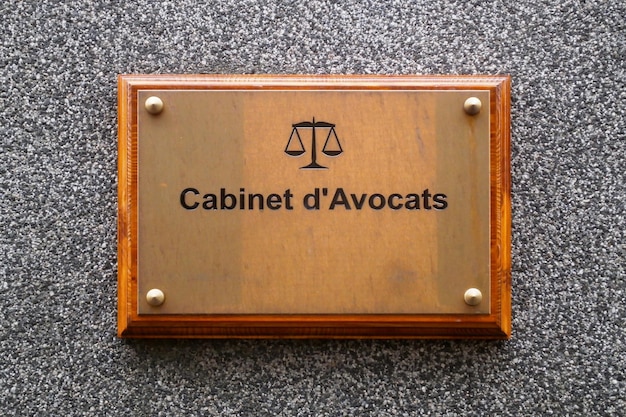 Photo french law office nameplate