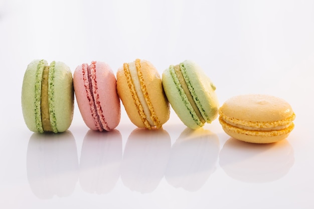 French macarons on white background different colorful macaroon tasty sweet color macaron colorful m