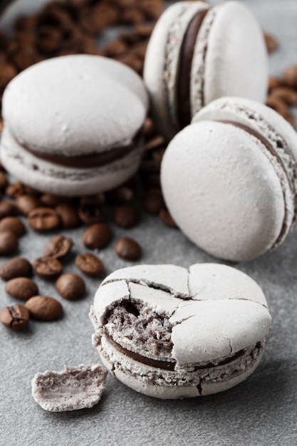 French macaroons isolated with coffee beans.