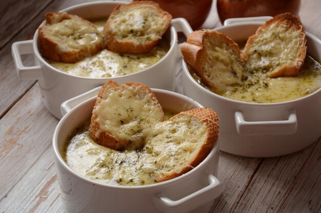 French Onion Soup with toasted bread and cheddar cheese