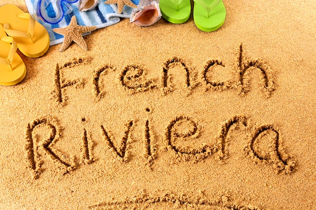 French Riviera beach writing