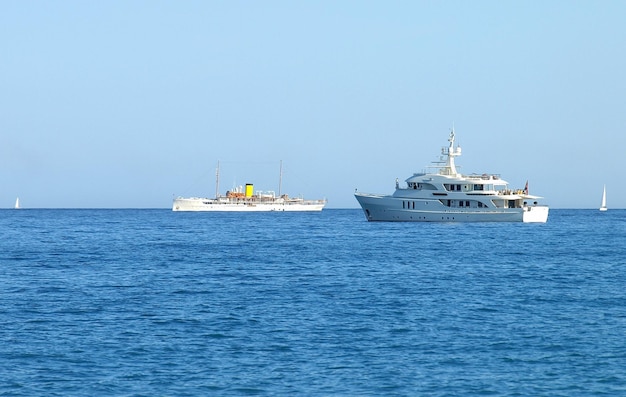 French Riviera Luxury Yacht and Old Passenger Ship