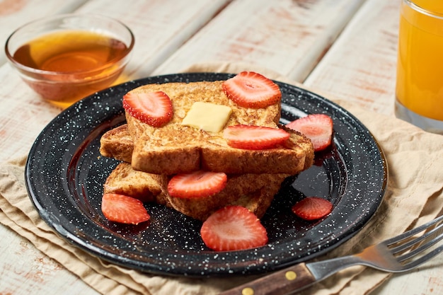 French toast garnished with strawberries Healthy morning breakfast