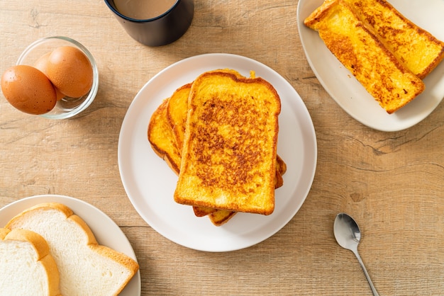 French toast on white plate for breakfast