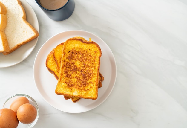 french toast on white plate for breakfast