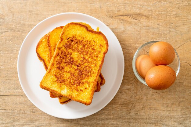 french toast on white plate for breakfast