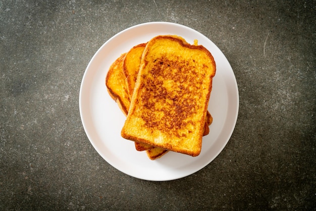 french toast on white plate