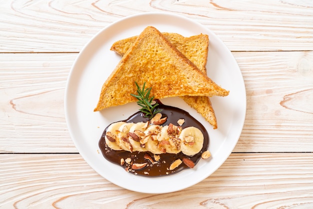 French toast with banana chocolate and almonds for breakfast