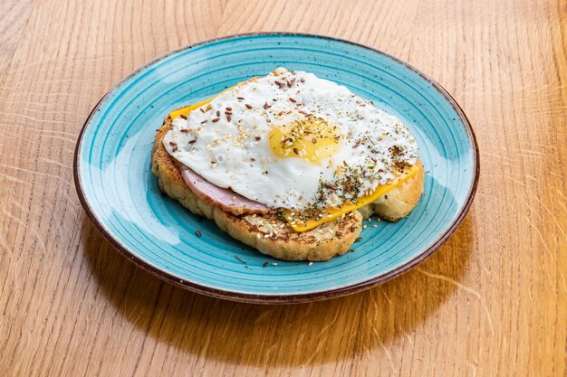 French toast with fried egg ham and cheddar cheese